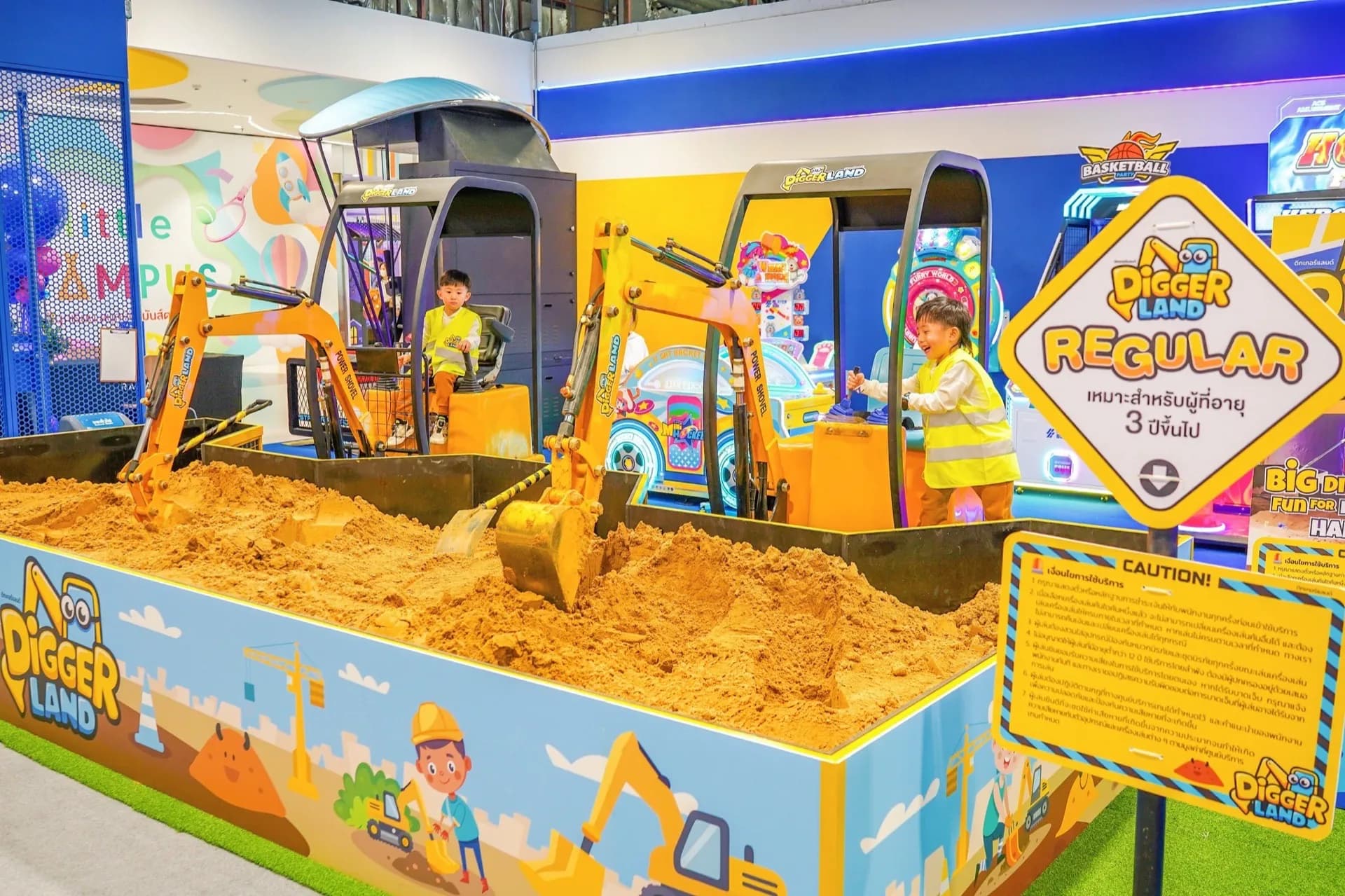 Kids driving mini excavators at Central Rama 3
