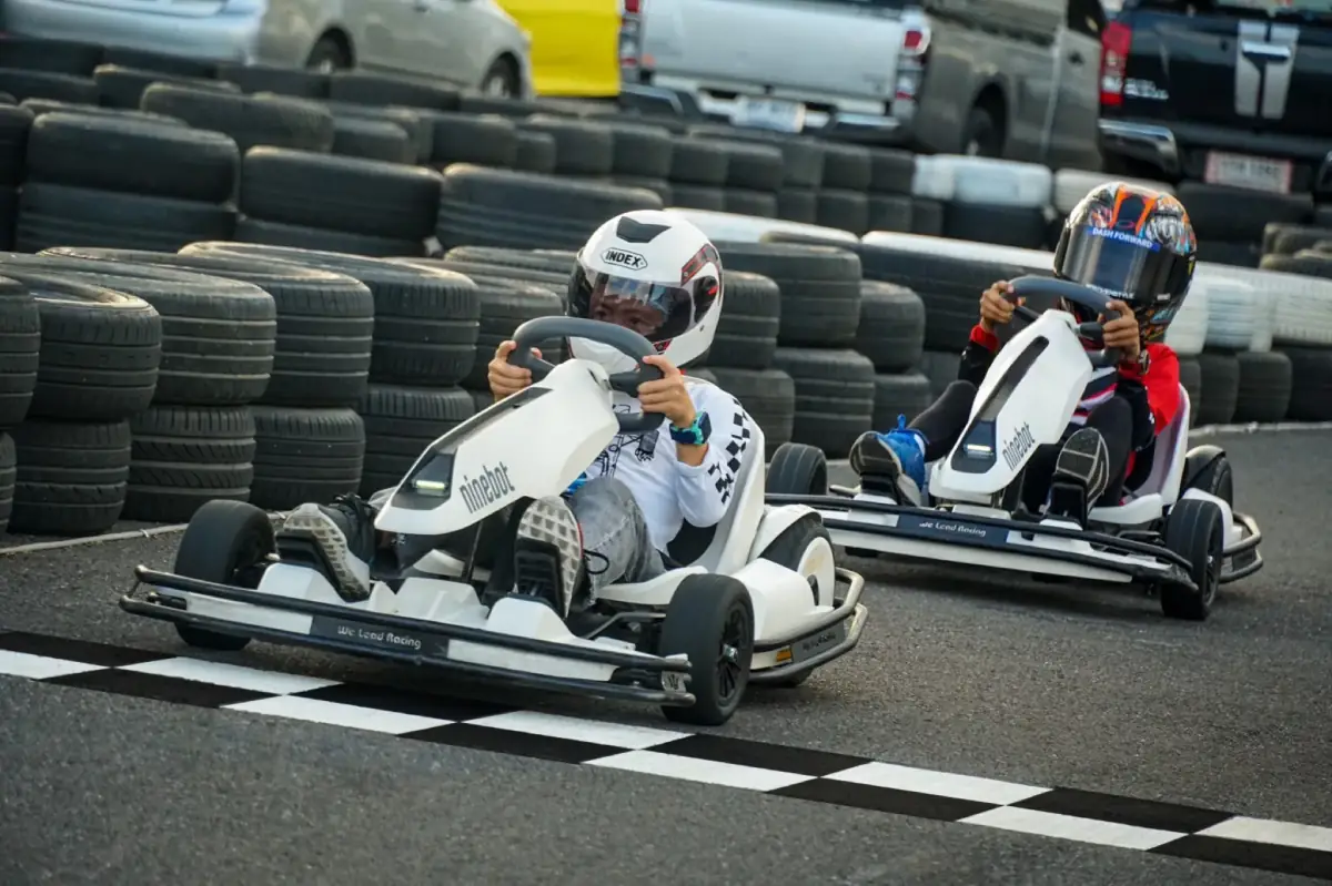 Two riders racing wheel-to-wheel at Chula 28