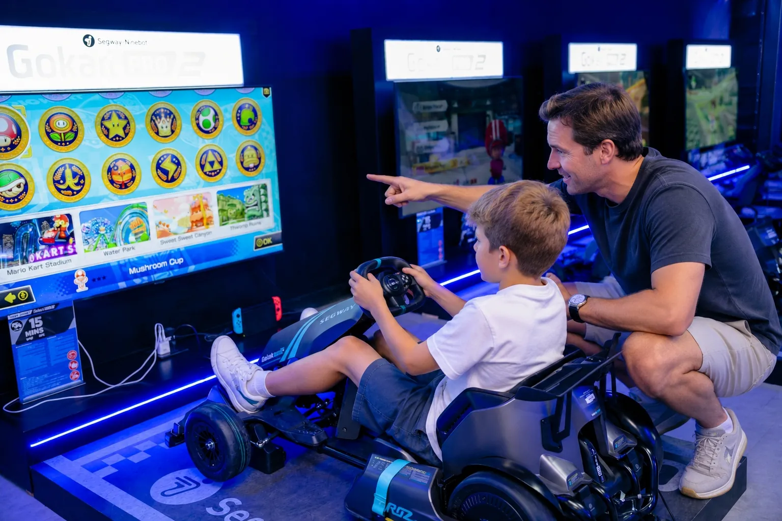 Father and child playing GoKart Simulator at Playerbox Chula 28