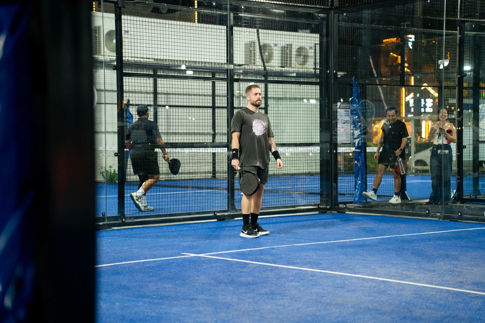 Sponsored Nut Walker Cup padel match in action on the glass-back court at Playerbox Chula 28