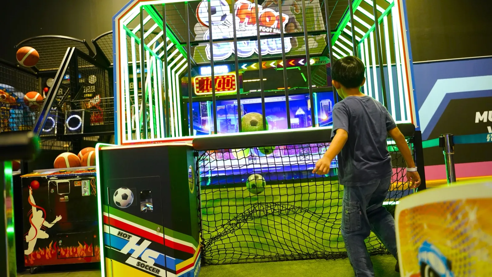 Kids playing the arcade floor games at Chula 28 Playerbox